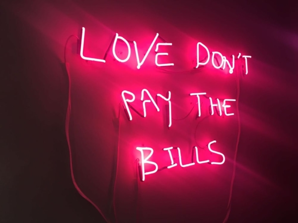 Love don't pay the bills (in neon lights, on wall), but timesheeting helps!